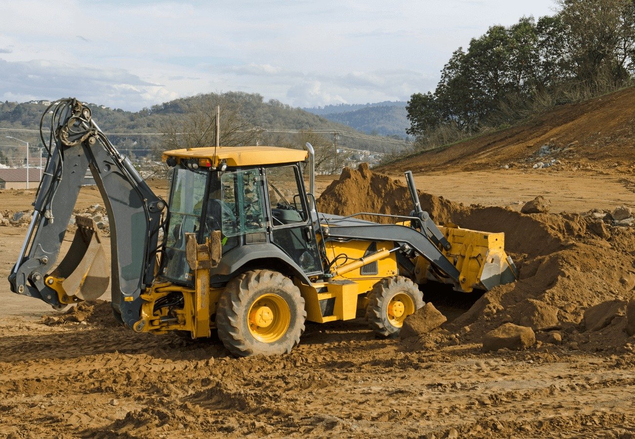 Retroescavadeira em operação